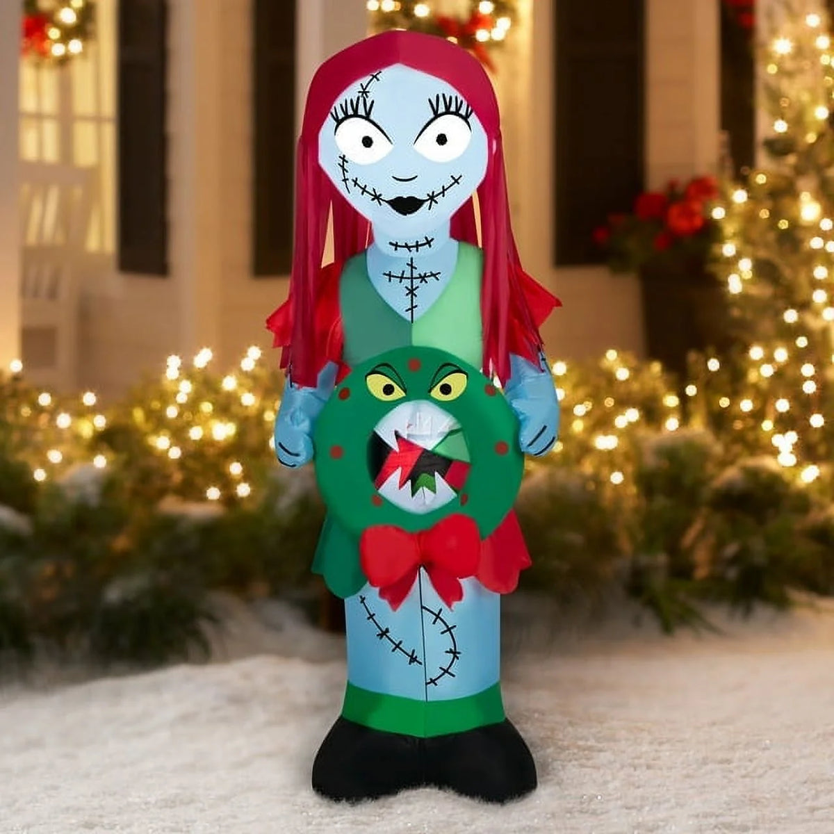 5.5 Foot Stylized Jack Skellington Inflatable with Spider Snowflake and Sally Holding Wreath Y5095